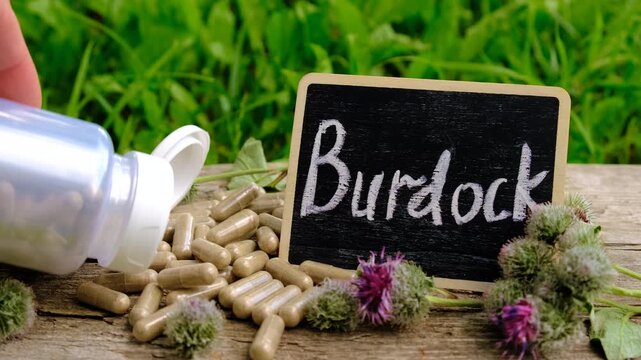 Burdock supplements in nature. Selective focus.