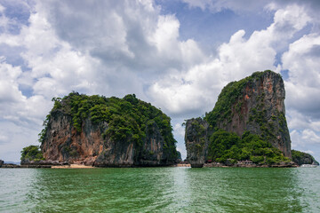 Fototapeta premium The iconic James Bond Island seen from a boat tour in Phang Nga Bay near Krabi, Thailand