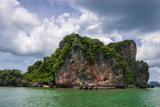 The iconic James Bond Island seen from a boat tour in Phang Nga Bay near Krabi, Thailand