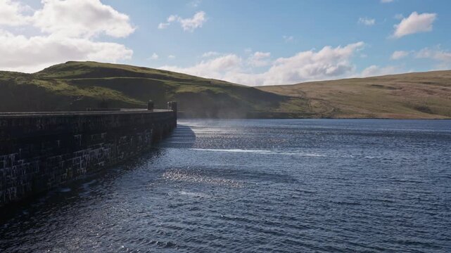 Wind blowing water at the top of Clearwen Dam elan Valley