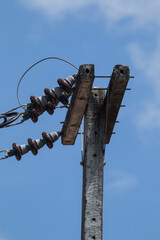 Obraz premium Closeup Eletricity line and electricity post