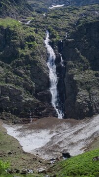 Waterfall of Cirque d'Anglade, a natural cirque in the ariege pyrenees in southwestern france. mountain landscape