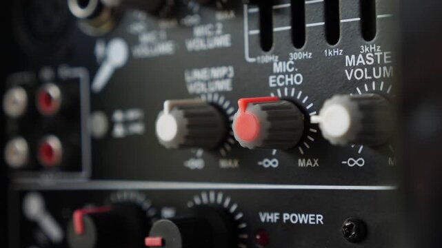 Professional audio equipment being adjusted for echo level control
