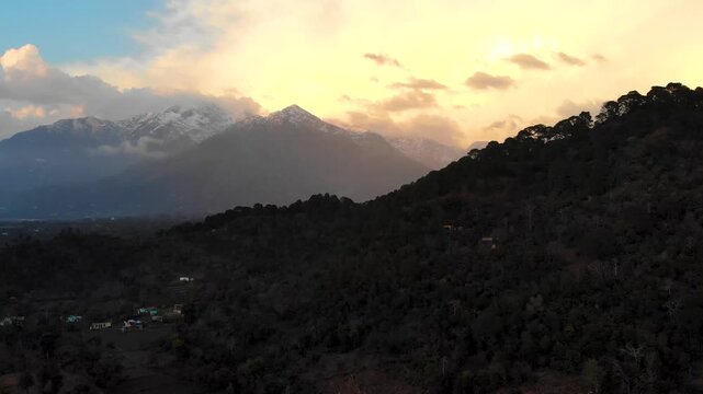 Majestic sunset reveal of Katra town and Himalayan mountains Trikuta hills Vaisho Devi.