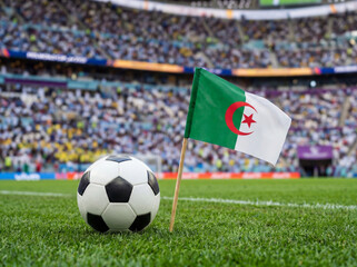Fototapeta premium Algeria flag and football on green field in stadium