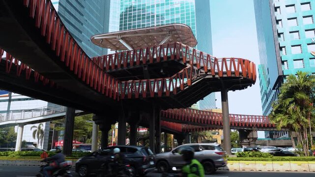Jembatan Phinisi Sudirman. The iconic Pinisi Karet (JPO Pinisi) pedestrian bridge is located on Jalan Sudirman, Jakarta, Indonesia, on June 14, 2023. The bridge has a unique ship-like design.