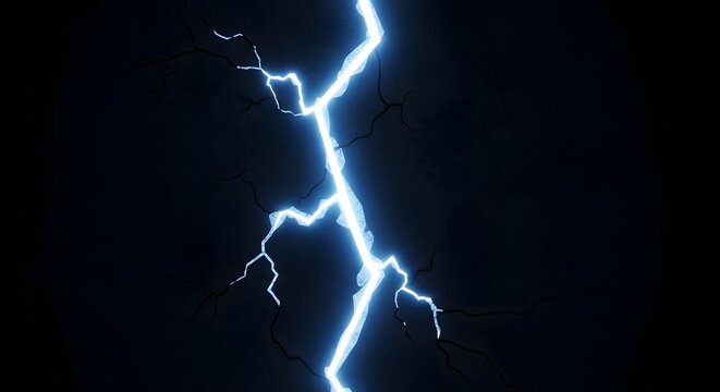 Lightning bolt strikes across a dark stormy sky during a powerful atmospheric weather event that illuminates the night horizon.
