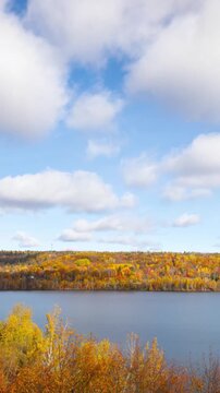 Time lapse of the clouds moving above the beautiful landscape near Houghton Michigan in the Autumn.