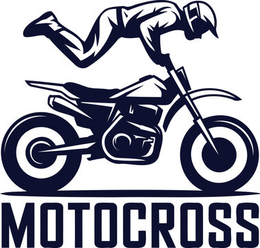 Motocross rider on a bike performing a stunt trick aerial maneuver
