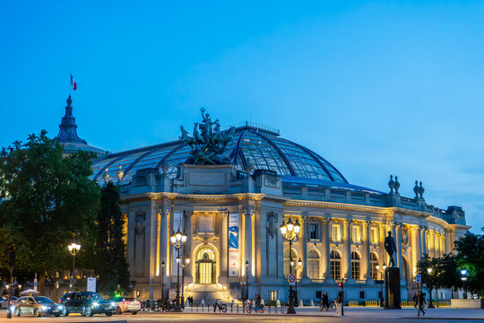 Grand Palais illuminated at blue hour twilight, Paris, France