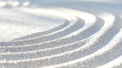 Naklejka premium Soft circular zen sand pattern with sparkling white grains, minimalist karesansui texture in sunlightきらめく白い砂粒の柔らかな円形の禅砂紋、日差しの中のミニマルな枯山水テクスチャ