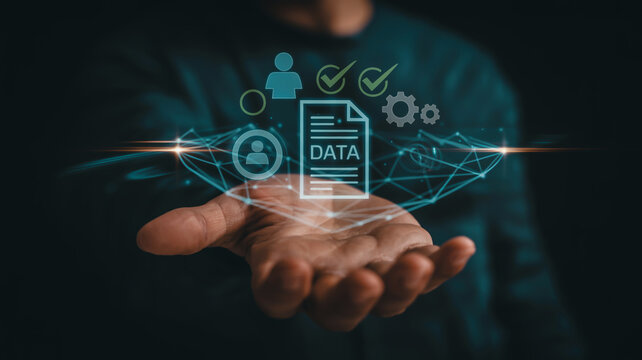 Hand holding digital data document with icons