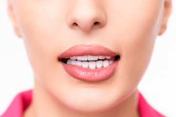 Naklejka premium Woman's mouth with bright, even teeth and glossy lips