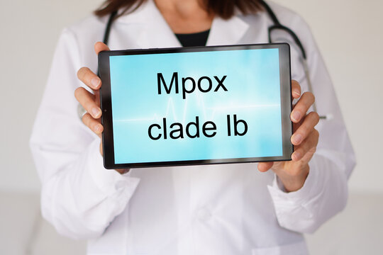 Mpox clade ib. professional doctor showing this disease on a medical tablet