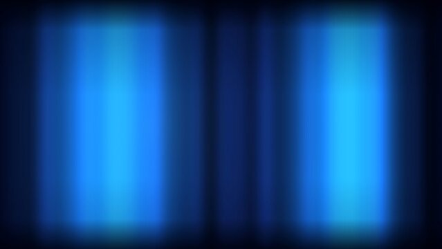 A blurry image of two blue vertical light beams on a dark background with a gradient effect