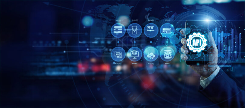 Software expert holding a mobile phone analyzing global API connection data on a holographic world map. Futuristic technology, secure network connections, and advanced data visualization.