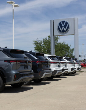 Volkswagen Tiguan display at a dealer. VW offers the Tiguan in S, SE, SE R-Line Black, and SEL R-Line Turbo models. MY:2026