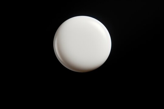 White botton pin black background simplicity porcelain.