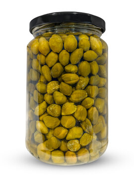 Pickled or brined capers in a glass jar isolated, featuring flower buds typical of Mediterranean cuisine