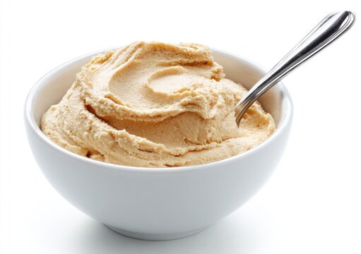 Creamy Peanut Butter Ice Cream in a White Bowl with Spoon.
