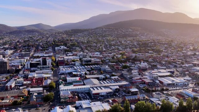 CDB of Hobart city in aerial panorama from Mt Wellington to Derwent river cove waterfront.