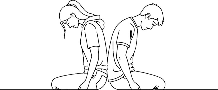Two people kneeling with heads bowed in reflection together.