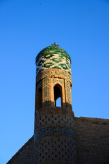 Small Tower with Green Tiles and Ornaments, Architecture Detail in Khiva, Uzbekistan © Dietmar