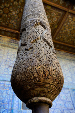 Intricate Carved Wooden Pillar Detail in the Kurnysh Khan Palace Aiwan Loggia in Konya Ark Palace, Khiva, Uzbekistan