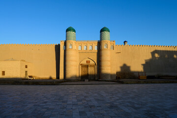 Konya Ark Palace Entrance Gate in the Golden Early Morning Light, Ichan Kala, Khiva, Uzbekistan © Dietmar