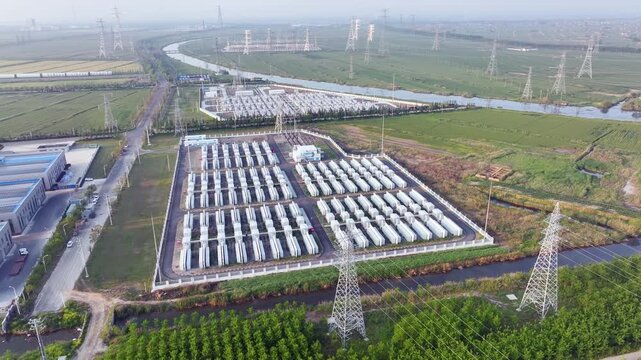 Aerial view of a substation facility surrounded by fields and waterways