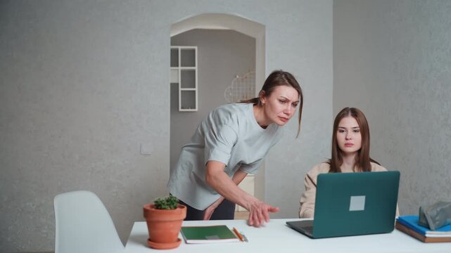 Mentor clearly shows concern. Instructor engages student with seriousness and focus. Teacher swiftly communicates urgency while instructor exhibits strong concern and intent toward student