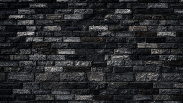 A weathered old brick wall with subtle gray tones and a textured surface, realistic stone construction, and a minimalist background.