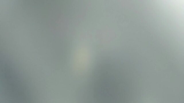 Una toma de cerca de un fondo abstracto de varios colores  con un efecto borroso o desenfoque en movimiento