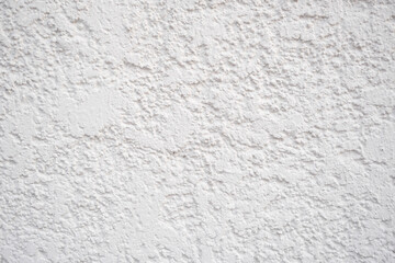 Fototapeta premium White plaster wall with rough texture