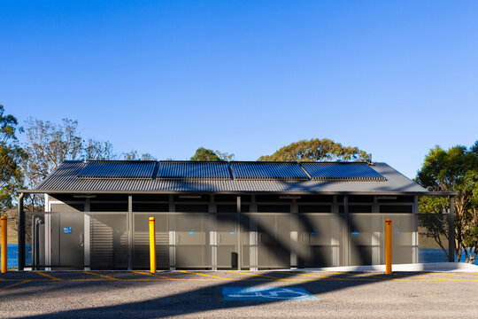 Solar panels on roof of new toilet and shower block building infrastructure
