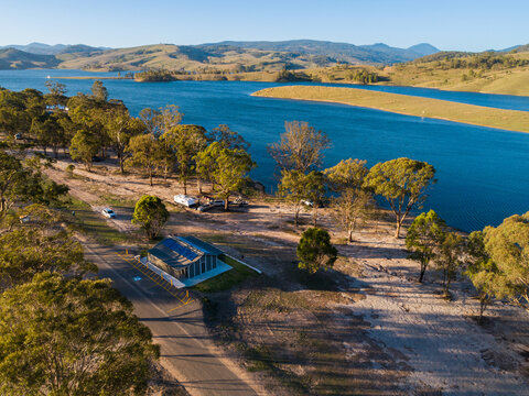 Aerial lakeside landscape with new amenities toilet and shower block building by waterside