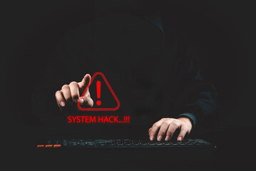 Cyber criminal in dark hoodie typing on keyboard triggering critical system hack security alert graphic interface for cybersecurity presentation background © khunkornStudio