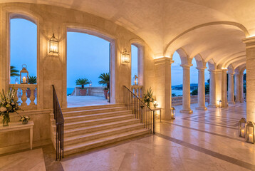 Fototapeta premium Elegant Mediterranean resort lobby with historic architecture and no people and reception wall