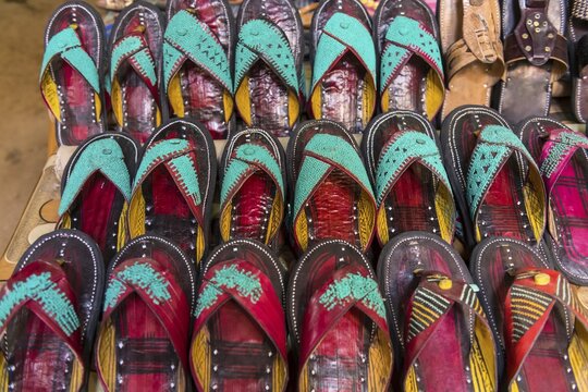Sale of slippers, sandals, traditional shoes, central market, Agadez, Niger