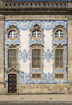 The facade of Igreja do Carmo church, adorned with intricate blue and white tiles, Porto, Portugal