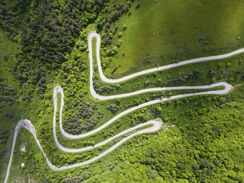 Serpentine road winding through green hills and forests, aerial view, road H52 above a tunnel, Dilijan, Dilijan, Delijan, Delijan, Dilijan National Park, Tavush Province, Tavush, Tavush, Armenia