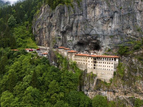 A monastery embedded in a green rocky landscape surrounded by dense forest, aerial view, Sumela Monastery, S&uuml;mela Manastırı, Ma&ccedil;ka, Macka, Trabzon Province, Turkey