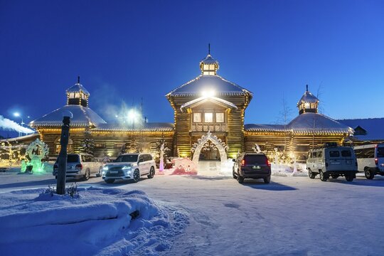 Beautiful traditional wooden house after sunset, Yakutsk, Sakha Republic, Russia