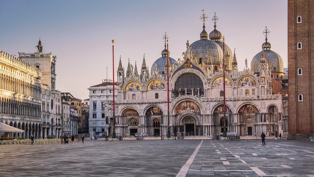 St. Mark's Square with clock tower and St. Mark's Basilica at sunrise, Venice, Veneto, Adriatic Sea, Northern Italy, Italy