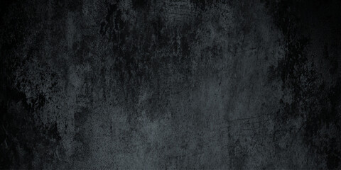 Obraz premium Dark gray grunge background texture with black and blue tones for design and decoration