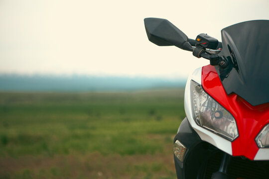motorcycle on the road in the field. close-up