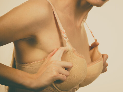 Woman wearing too big bra