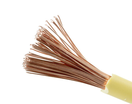 Macro shot of fanned copper wires from a cut cable, yellow plastic insulation, white background