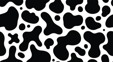 Black and white cow print pattern seamless background. © Vira