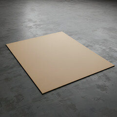 Beige rectangular piece of material on a gray concrete surface. Blank surface for mockup or design presentation.